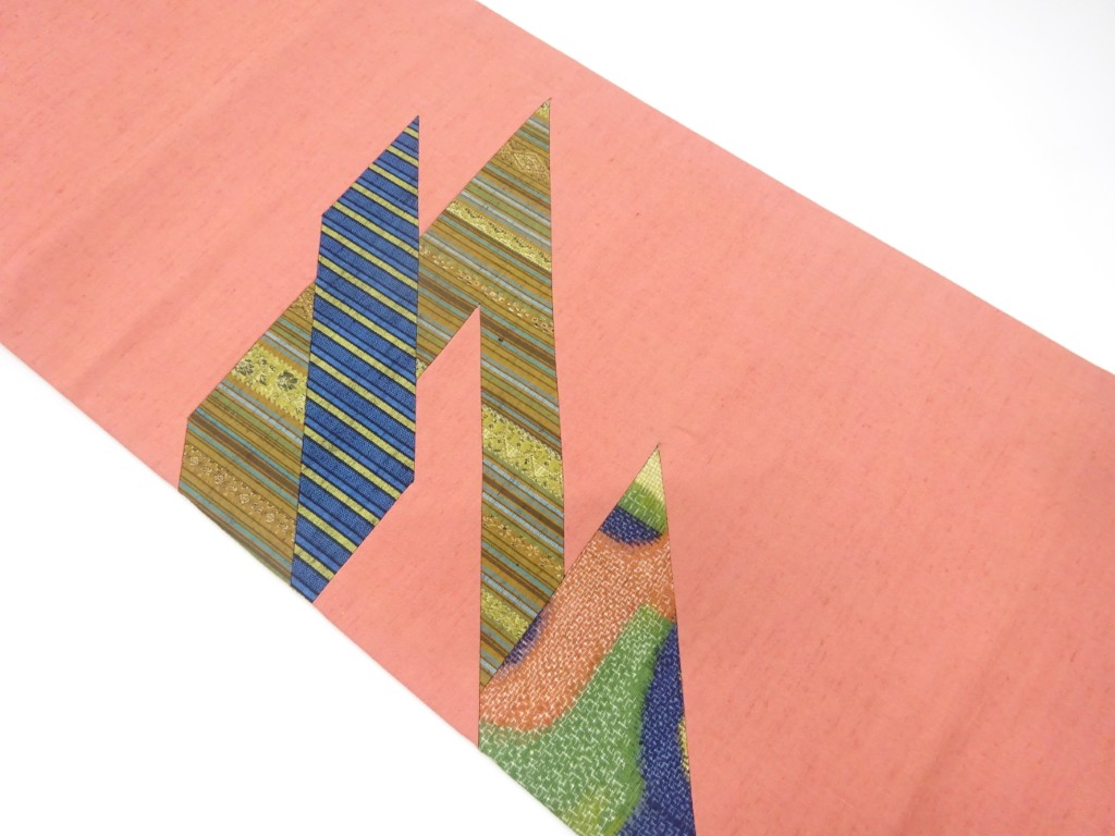 手織り紬　切りばめ　縞に抽象模様織り出し　開き名古屋帯（額縁仕立て）